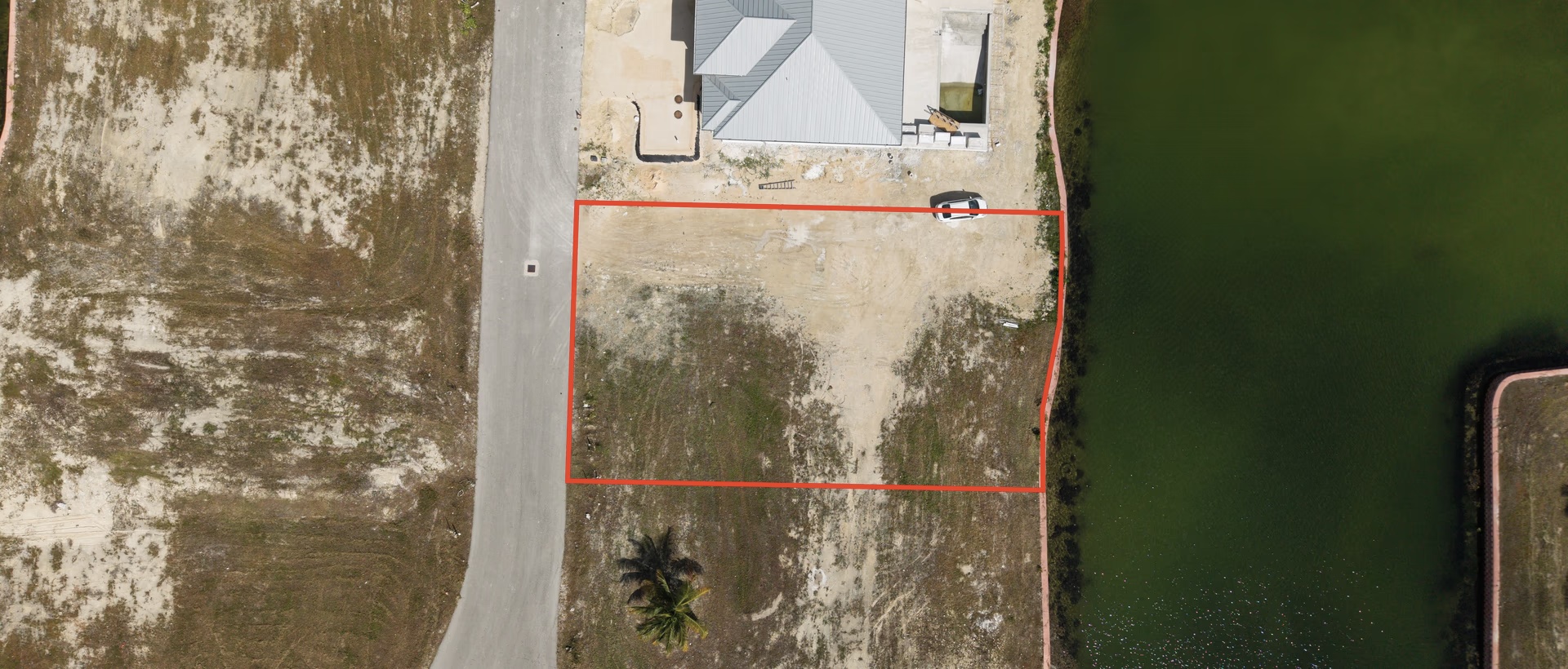 0.24 Acre Canal Lot In Gated Community - Mustique Cove