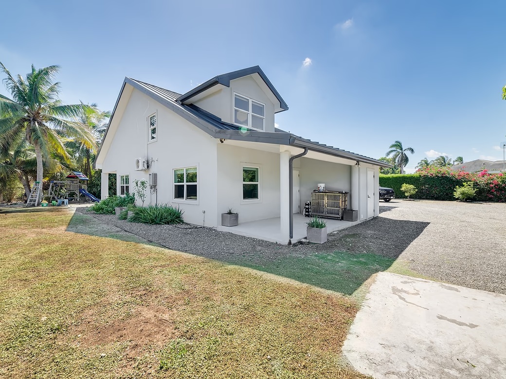 Elevated, 6-bedroom Single Family Home On A Massive Parcel