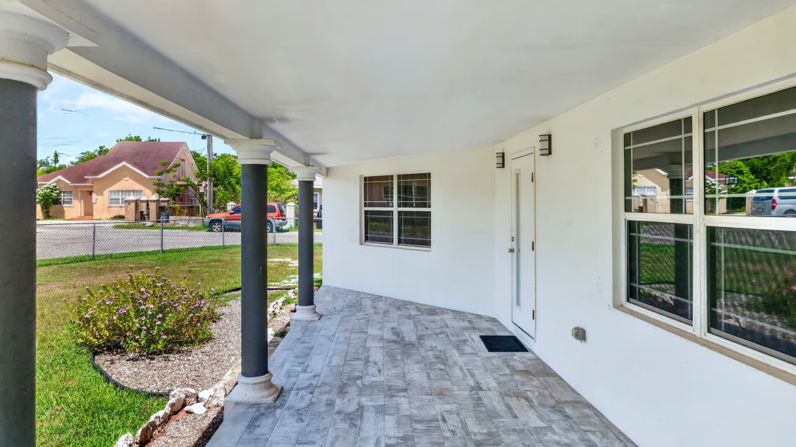 West Bay 2 Bed / 2 Bath Single Family Home With Fenced Yard & Solar Panels