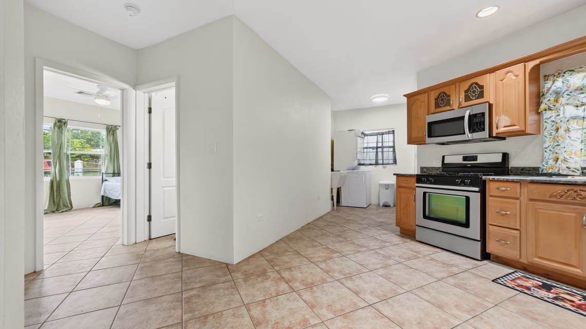 West Bay 2 Bed / 2 Bath Single Family Home With Fenced Yard & Solar Panels