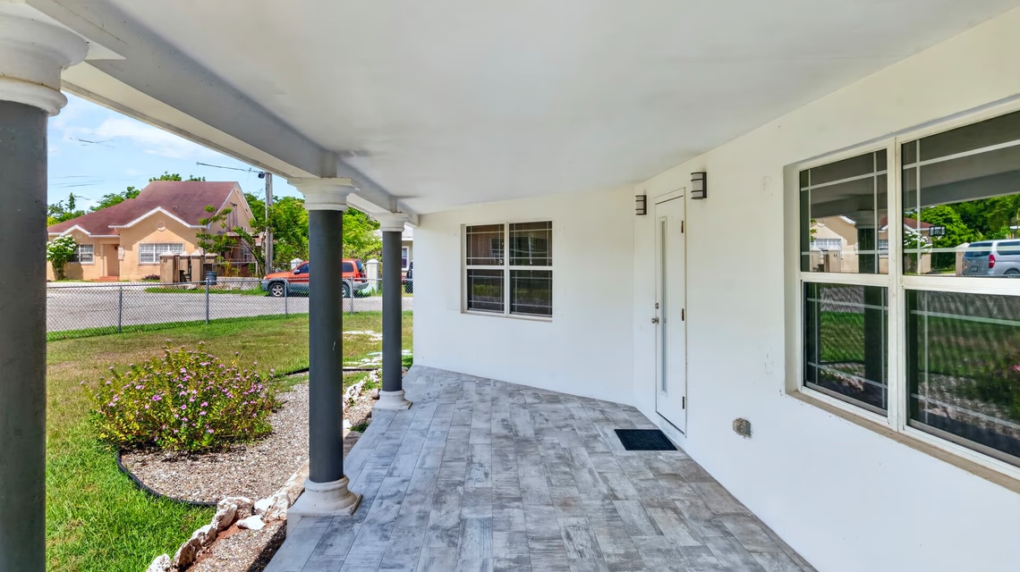 West Bay 2 Bed / 2 Bath Single Family Home With Fenced Yard & Solar Panels
