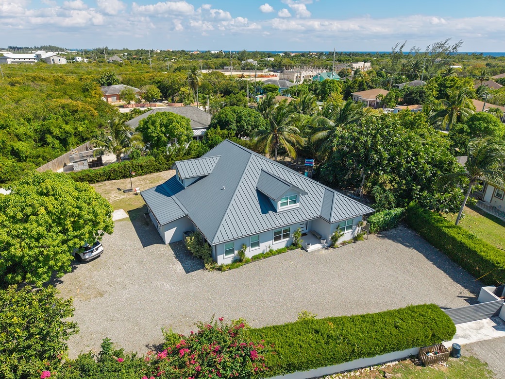 Elevated, 6-bedroom Single Family Home On A Massive Parcel