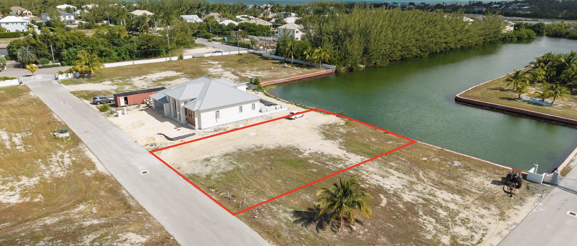 0.24 Acre Canal Lot In Gated Community - Mustique Cove