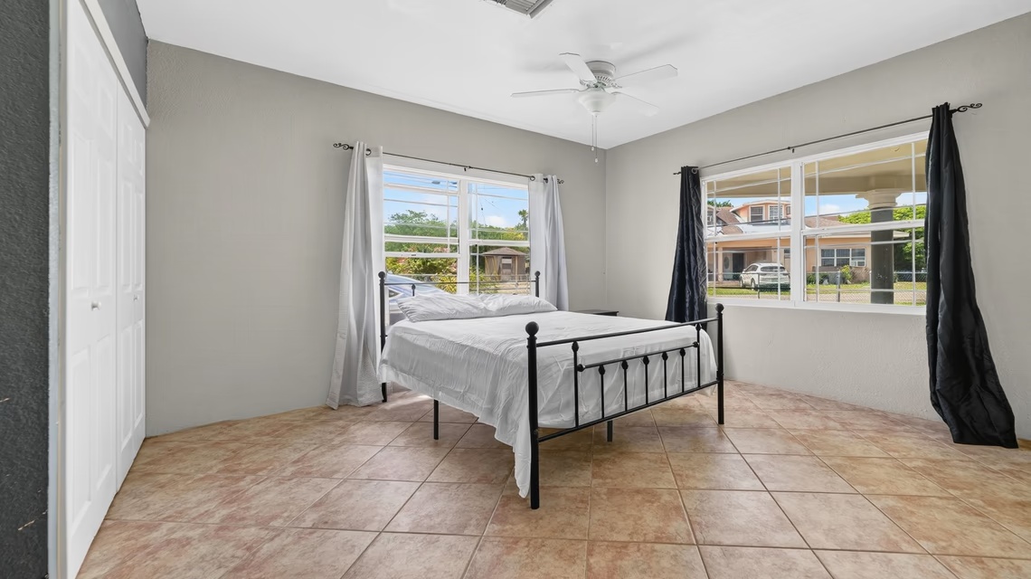 West Bay 2 Bed / 2 Bath Single Family Home With Fenced Yard & Solar Panels