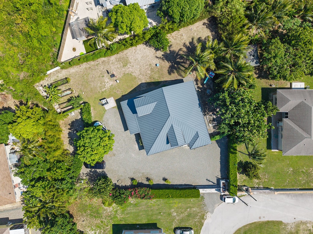 Elevated, 6-bedroom Single Family Home On A Massive Parcel