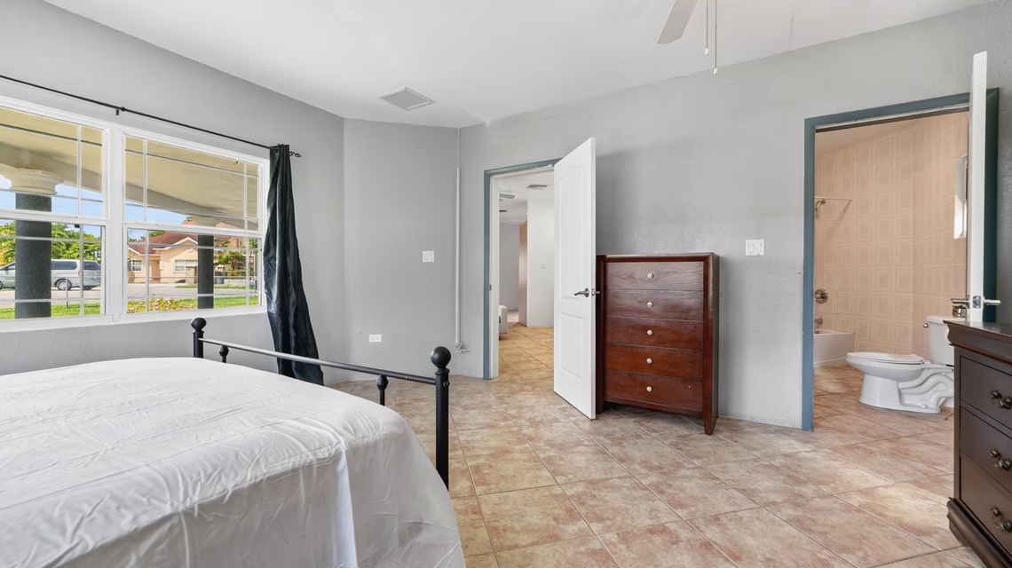 West Bay 2 Bed / 2 Bath Single Family Home With Fenced Yard & Solar Panels